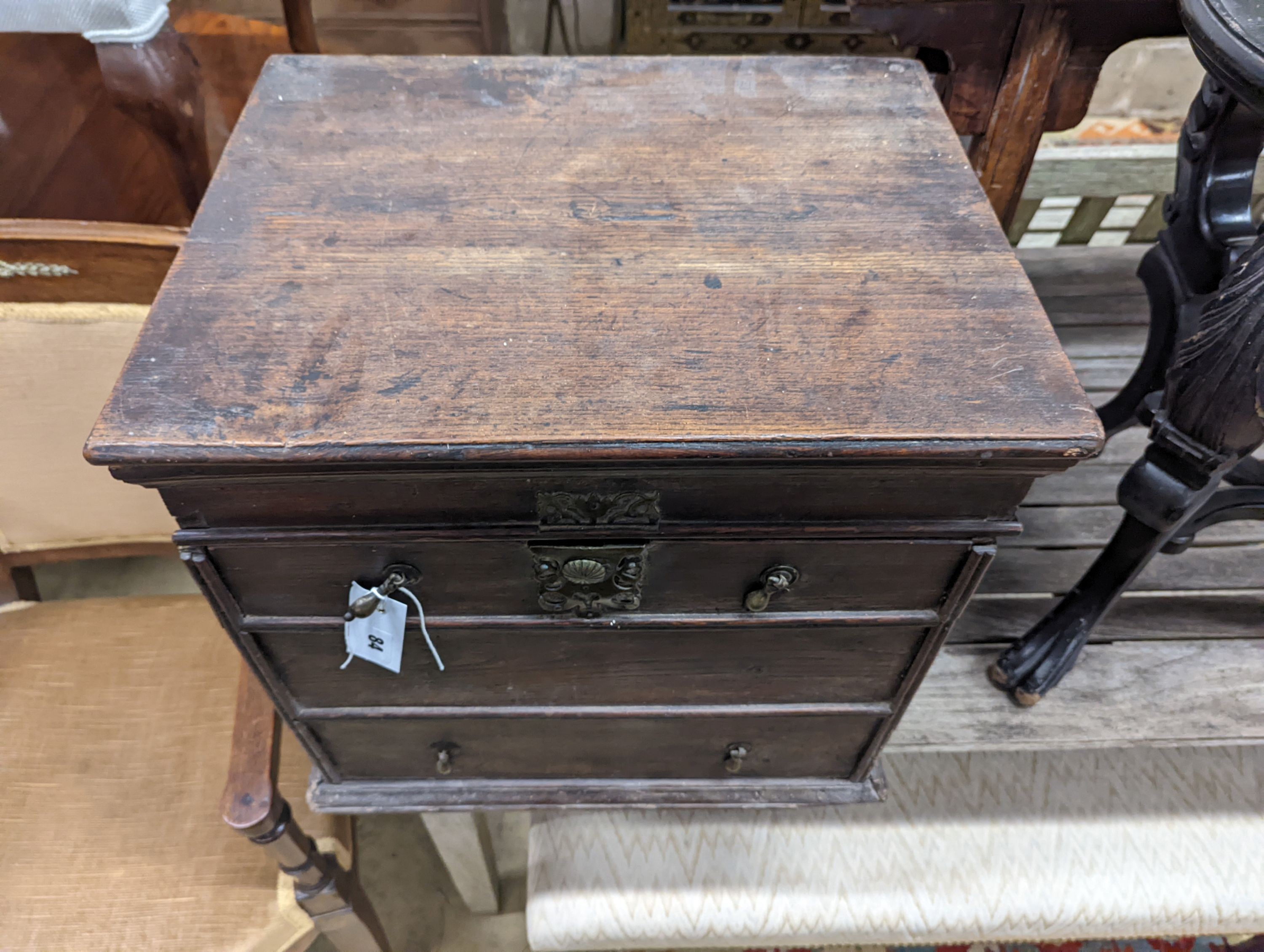 An oak log box, width 49cm, depth 38cm, height 46cm